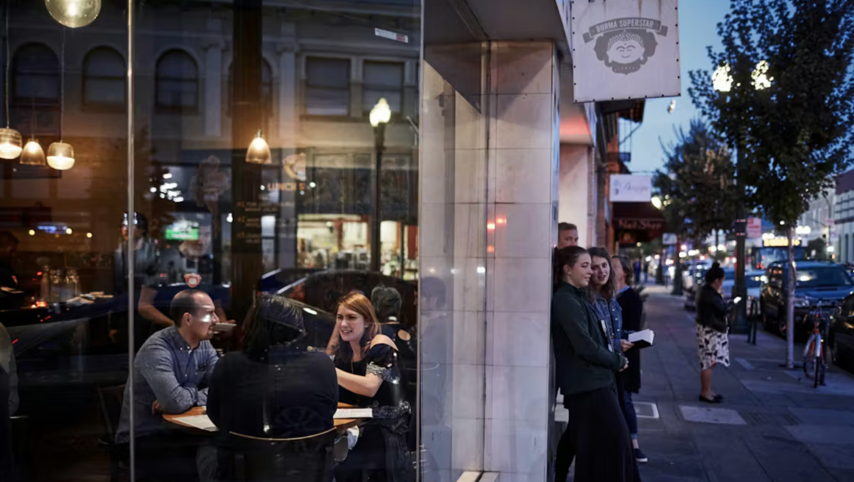 Guests waiting in line outside Burma Superstar on Clement Street
